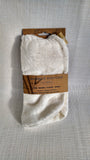 Hair Drying turban style towel, made of bamboo and cotton in a terry cloth loop finish, the colour of this hair wrap in natural/off white.