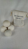 woolen dryer balls group stacked and bag of woolen dryer balls display