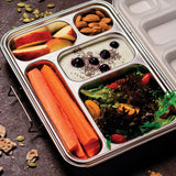 nestling bento lunch box stainless steel with 5 compartments, showing carrots, apples, almonds, yoghurt & blueberries, and lettuce tomato salad